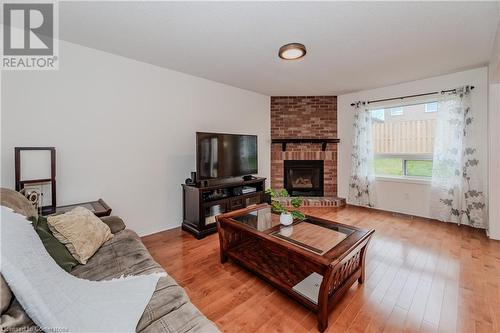 27 Attwood Drive, Cambridge, ON - Indoor Photo Showing Living Room With Fireplace