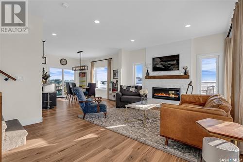 68 Meadowlark Crescent, Blucher Rm No. 343, SK - Indoor Photo Showing Living Room With Fireplace