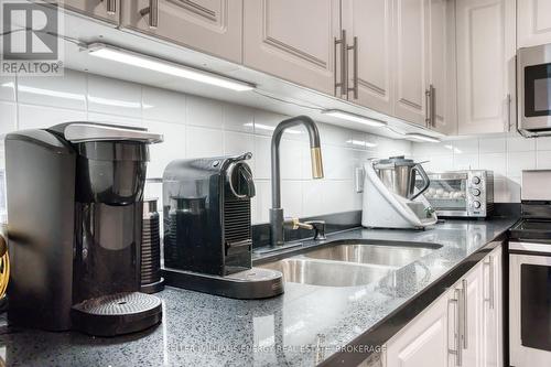 103 - 1000 The Esplanade Street N, Pickering (Town Centre), ON - Indoor Photo Showing Kitchen With Double Sink