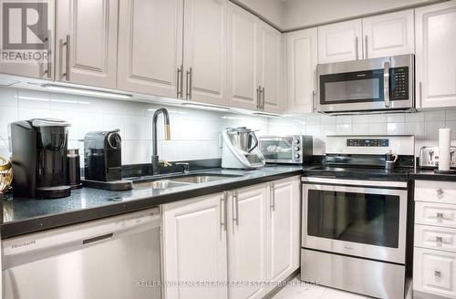 103 - 1000 The Esplanade Street N, Pickering (Town Centre), ON - Indoor Photo Showing Kitchen With Stainless Steel Kitchen With Double Sink