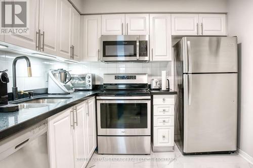 103 - 1000 The Esplanade Street N, Pickering (Town Centre), ON - Indoor Photo Showing Kitchen With Stainless Steel Kitchen With Double Sink