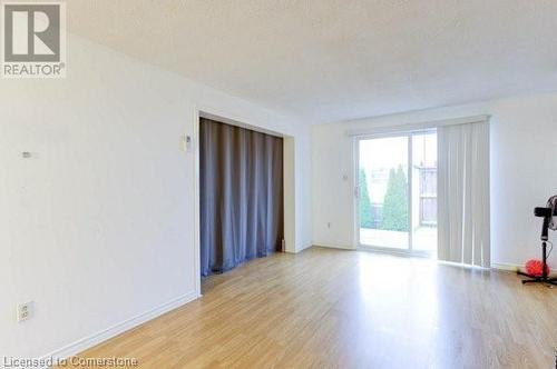 Unfurnished room with light wood-type flooring - 539 Briarwood Avenue, Listowel, ON - Indoor Photo Showing Other Room