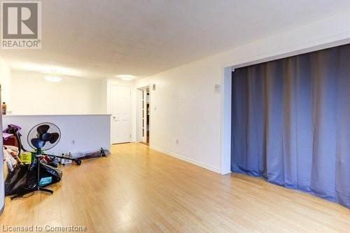 Workout area featuring light hardwood / wood-style floors - 539 Briarwood Avenue, Listowel, ON - Indoor Photo Showing Other Room