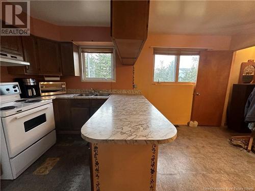 17 Colette Street, Charlo, NB - Indoor Photo Showing Kitchen With Double Sink