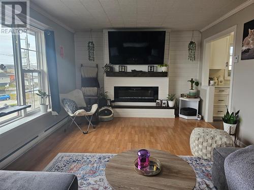 73-75 Main Street, Channel-Port Aux Basques, NL - Indoor Photo Showing Living Room With Fireplace