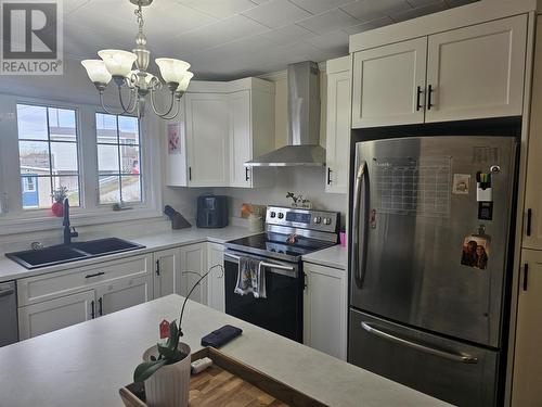 73-75 Main Street, Channel-Port Aux Basques, NL - Indoor Photo Showing Kitchen With Double Sink