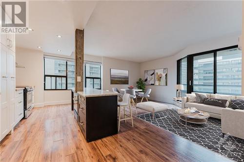 Virtually Staged - 556 Laurier Avenue W Unit#906, Ottawa, ON - Indoor Photo Showing Living Room