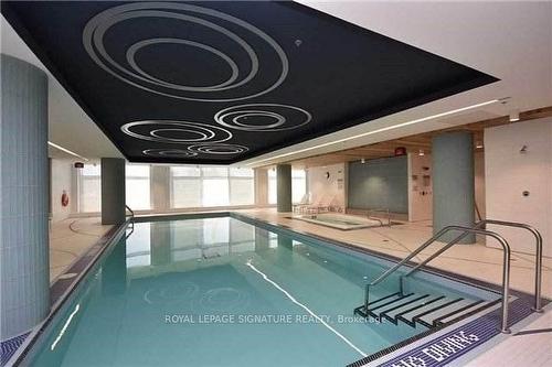 1113-55 Speers Rd, Oakville, ON - Indoor Photo Showing Other Room With In Ground Pool