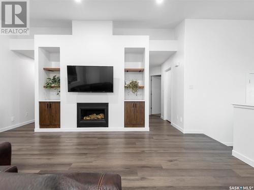 1655 Rousseau Crescent, Regina, SK - Indoor Photo Showing Living Room With Fireplace