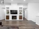 1655 Rousseau Crescent, Regina, SK  - Indoor Photo Showing Living Room With Fireplace 