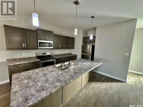 6264 Little Pine Loop, Regina, SK - Indoor Photo Showing Kitchen With Stainless Steel Kitchen With Double Sink With Upgraded Kitchen