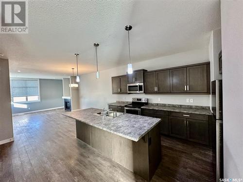 6264 Little Pine Loop, Regina, SK - Indoor Photo Showing Kitchen With Double Sink With Upgraded Kitchen