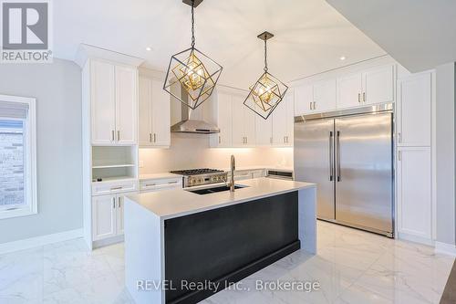 7354 Sherrilee Crescent N, Niagara Falls (222 - Brown), ON - Indoor Photo Showing Kitchen