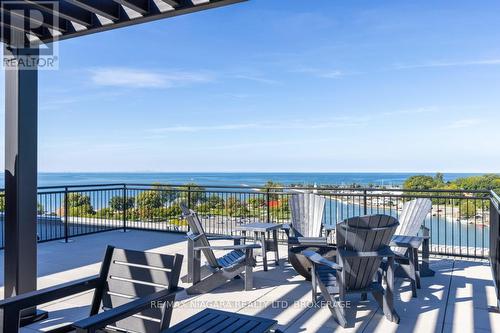 302 - 57 Lakeport Road, St. Catharines (438 - Port Dalhousie), ON - Outdoor With Body Of Water With Balcony With View With Exterior