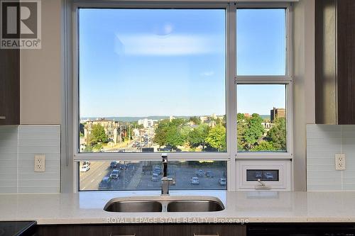 603 - 150 Main Street W, Hamilton, ON - Indoor Photo Showing Kitchen With Double Sink