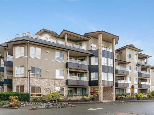 205-6738 Dickinson Rd, Nanaimo, BC - Outdoor With Balcony With Facade