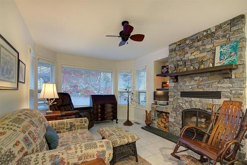 3889 Gallaghers Grange, Kelowna, BC - Indoor Photo Showing Living Room With Fireplace