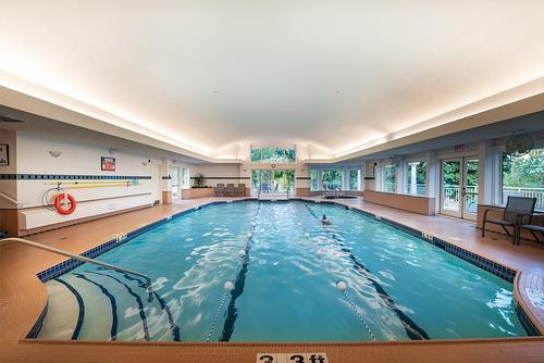 3889 Gallaghers Grange, Kelowna, BC - Indoor Photo Showing Other Room With In Ground Pool