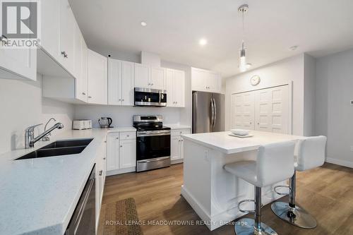 218 Elora Street, Minto, ON - Indoor Photo Showing Kitchen With Double Sink With Upgraded Kitchen