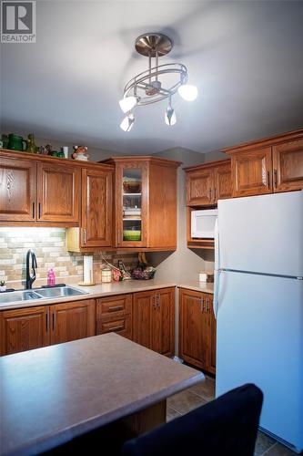 3 Brock Crescent, Gander, NL - Indoor Photo Showing Kitchen With Double Sink