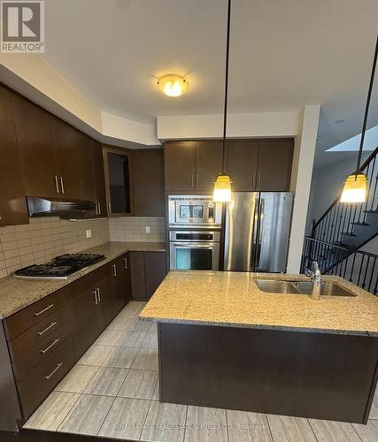 17 - 5710 Long Valley Road, Mississauga, ON - Indoor Photo Showing Kitchen With Stainless Steel Kitchen With Double Sink With Upgraded Kitchen