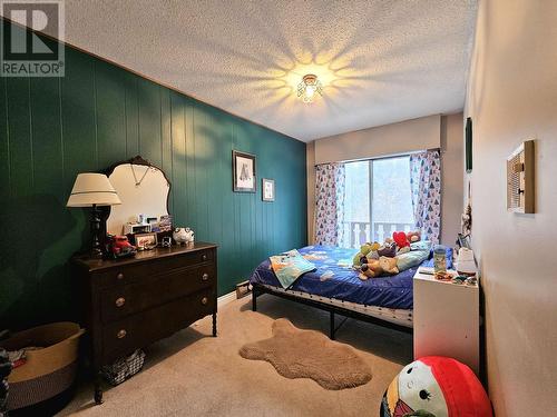 4975 Plateau Road, 108 Mile Ranch, BC - Indoor Photo Showing Bedroom