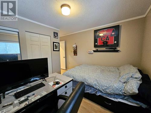 4975 Plateau Road, 108 Mile Ranch, BC - Indoor Photo Showing Bedroom