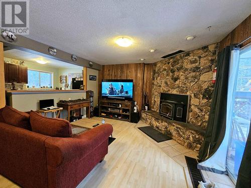 4975 Plateau Road, 108 Mile Ranch, BC - Indoor With Fireplace