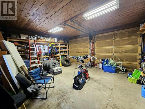 4975 Plateau Road, 108 Mile Ranch, BC - Indoor Photo Showing Garage