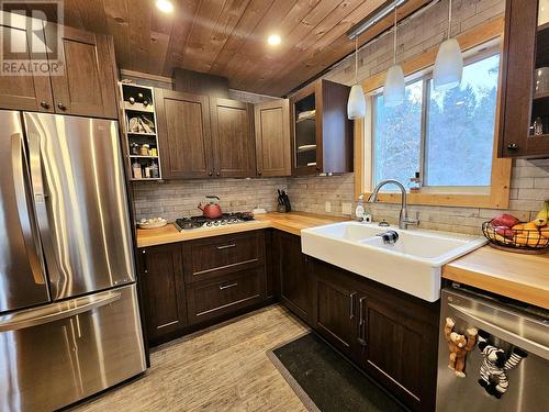 4975 Plateau Road, 108 Mile Ranch, BC - Indoor Photo Showing Kitchen With Double Sink With Upgraded Kitchen