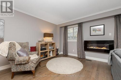 4 Lynden Circle, Halton Hills, ON - Indoor Photo Showing Living Room With Fireplace