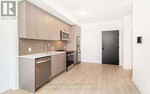 1107 - 3220 William Coltson Avenue, Oakville, ON - Indoor Photo Showing Kitchen With Stainless Steel Kitchen