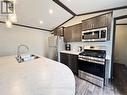 8 - 7100 County Rd 18, Alnwick/Haldimand, ON  - Indoor Photo Showing Kitchen With Double Sink 