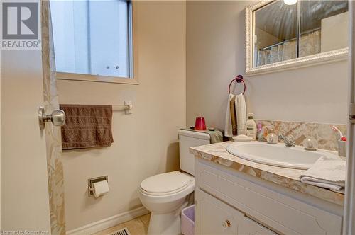 Bathroom featuring tile patterned floors, vanity, and toilet - 116 Glamis Road, Cambridge, ON - Indoor Photo Showing Bathroom