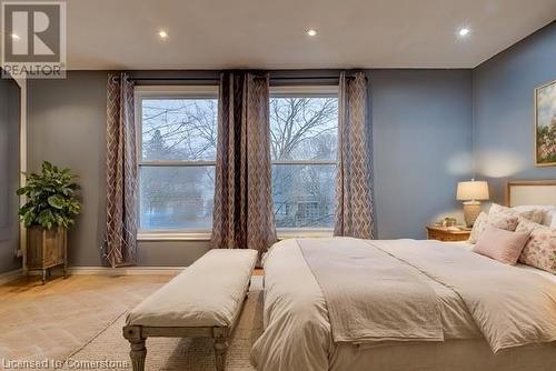 Virtual Staged Bedroom with multiple windows - 116 Glamis Road, Cambridge, ON - Indoor Photo Showing Bedroom