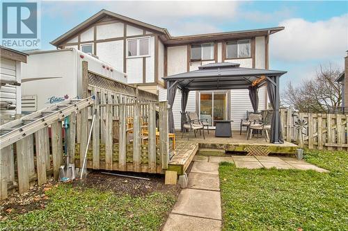 Rear view of house featuring a gazebo, a lawn, and a deck - 116 Glamis Road, Cambridge, ON - Outdoor