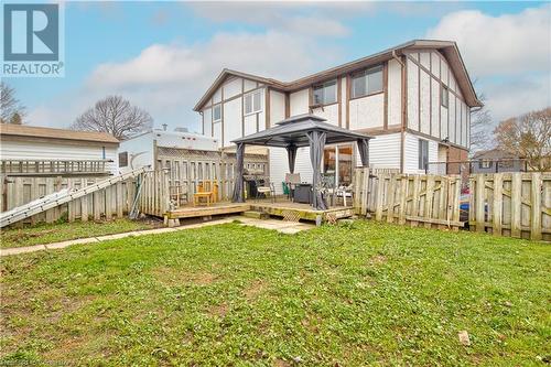 Back of property with a gazebo, a deck, and a lawn - 116 Glamis Road, Cambridge, ON - Outdoor