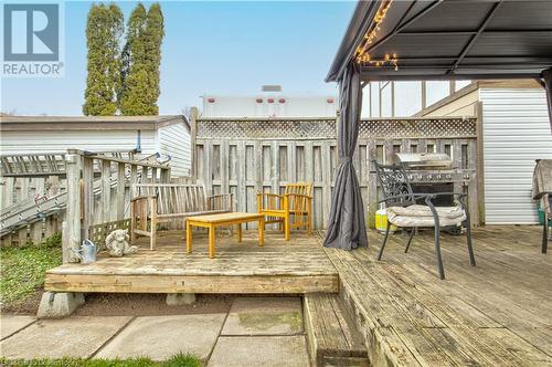 Wooden deck featuring area for grilling - 116 Glamis Road, Cambridge, ON - Outdoor With Exterior