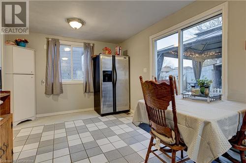 View of tiled dining room - 116 Glamis Road, Cambridge, ON - Indoor