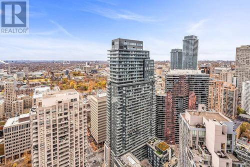 3906 - 11 Wellesley Street W, Toronto, ON - Outdoor With Facade