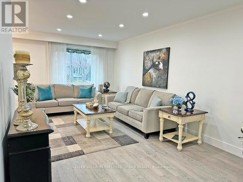 27 Crendon Drive, Toronto, ON - Indoor Photo Showing Living Room