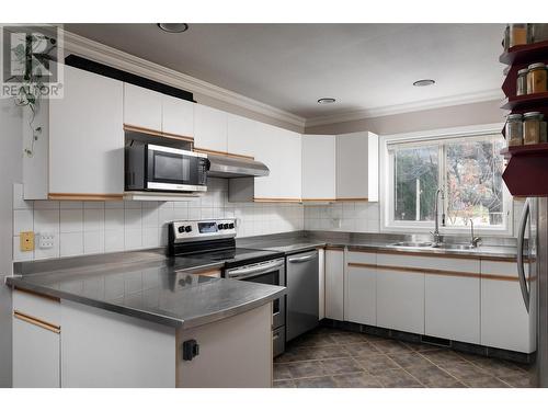 Main level - 2745 Northview Place, Lake Country, BC - Indoor Photo Showing Kitchen With Double Sink