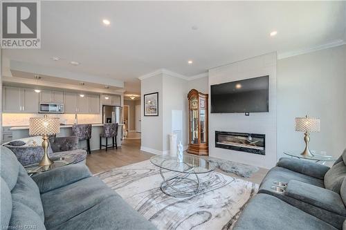 1880 Gordon Street Unit# 805, Guelph, ON - Indoor Photo Showing Living Room With Fireplace