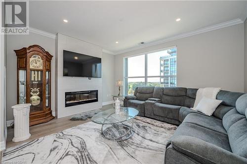 1880 Gordon Street Unit# 805, Guelph, ON - Indoor Photo Showing Living Room With Fireplace