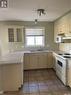 302 2217 Angus Street, Regina, SK  - Indoor Photo Showing Kitchen With Double Sink 