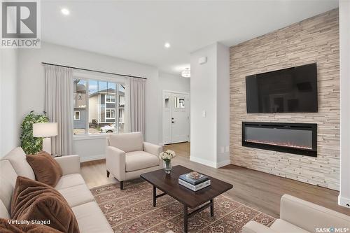 167 Kostiuk Crescent, Saskatoon, SK - Indoor Photo Showing Living Room With Fireplace