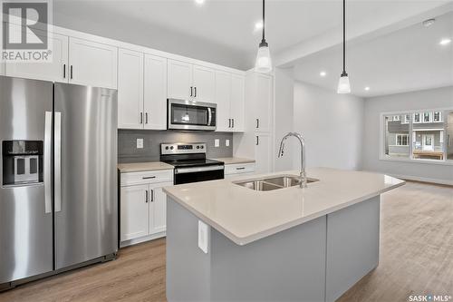 167 Kostiuk Crescent, Saskatoon, SK - Indoor Photo Showing Kitchen With Double Sink With Upgraded Kitchen