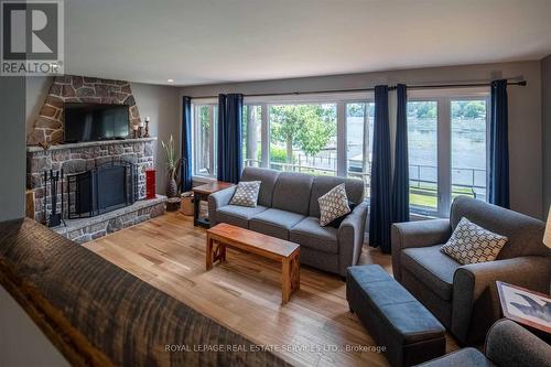 2365 Selwyn Bay Lane, Smith-Ennismore-Lakefield, ON - Indoor Photo Showing Living Room With Fireplace