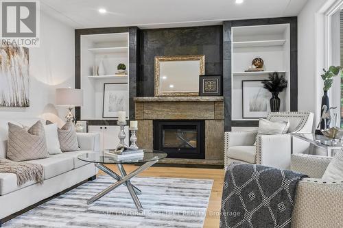 883 Westbury Place, London, ON - Indoor Photo Showing Living Room With Fireplace