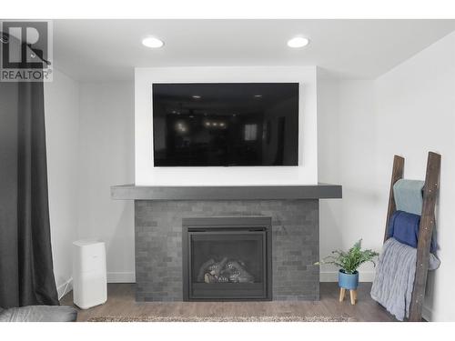 1694 Kingfisher Avenue, Kitimat, BC - Indoor Photo Showing Living Room With Fireplace